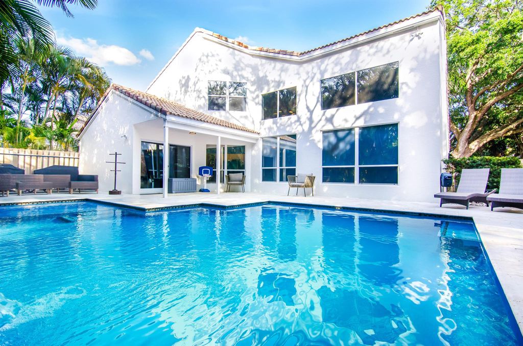 Photo of 1027 Siena Oaks Circle W, Palm Beach Gardens, FL 33410 (MLS # R11082640)