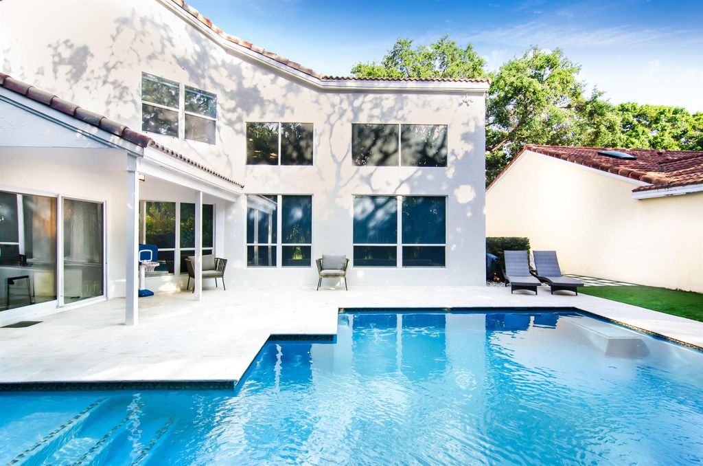 Photo of 1027 Siena Oaks Circle W, Palm Beach Gardens, FL 33410 (MLS # R11082640)