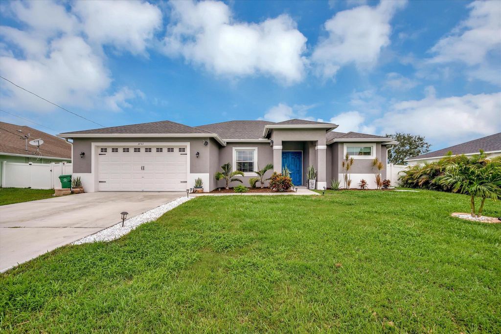 Photo of 3733 SW Wycoff Street, Port St Lucie, FL 34953 (MLS # R10893418)