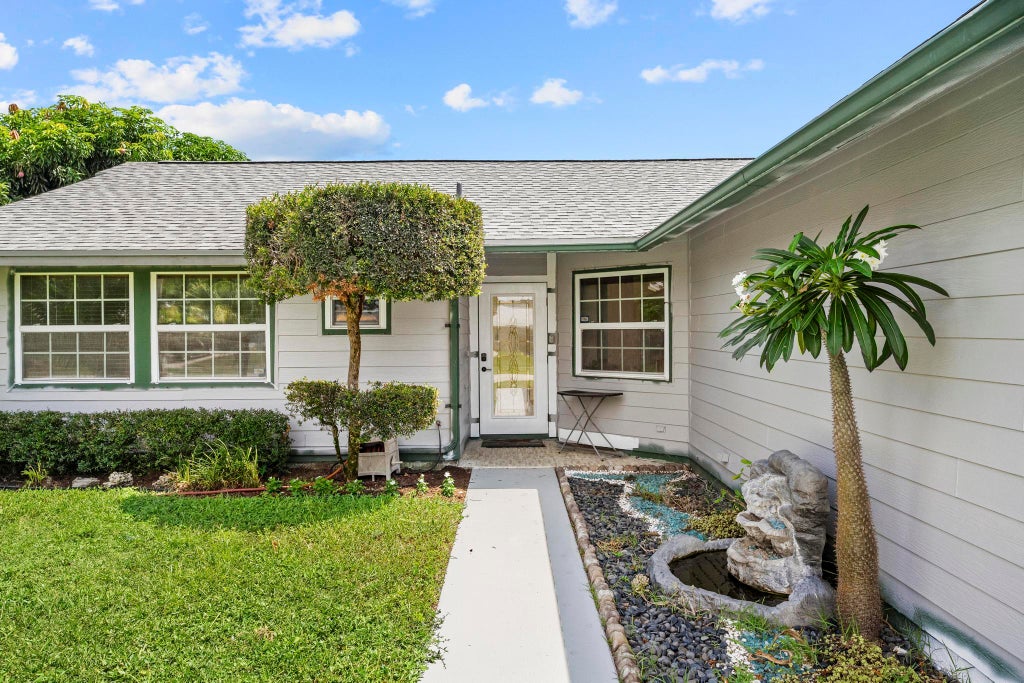 Photo of 5016 El Claro Circle, West Palm Beach, FL 33415 (MLS # B26051814)