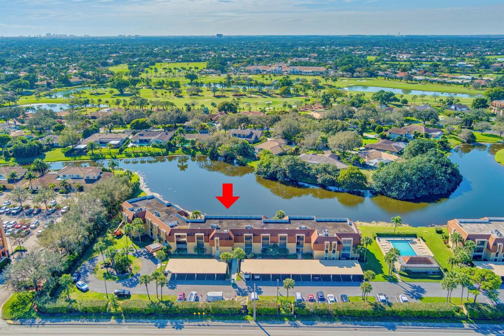 Photo of 5188 Woodland Lakes Drive #234, Palm Beach Gardens, FL 33418 (MLS # R10957424)