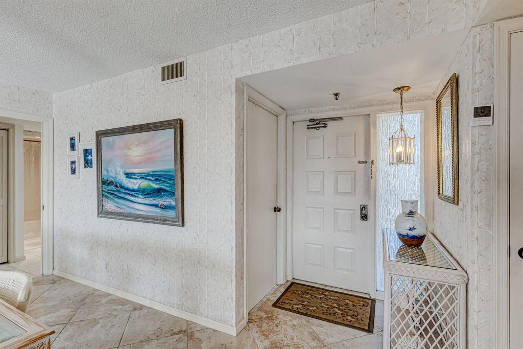 Photo of 5188 Woodland Lakes Drive #234, Palm Beach Gardens, FL 33418 (MLS # R10957424)