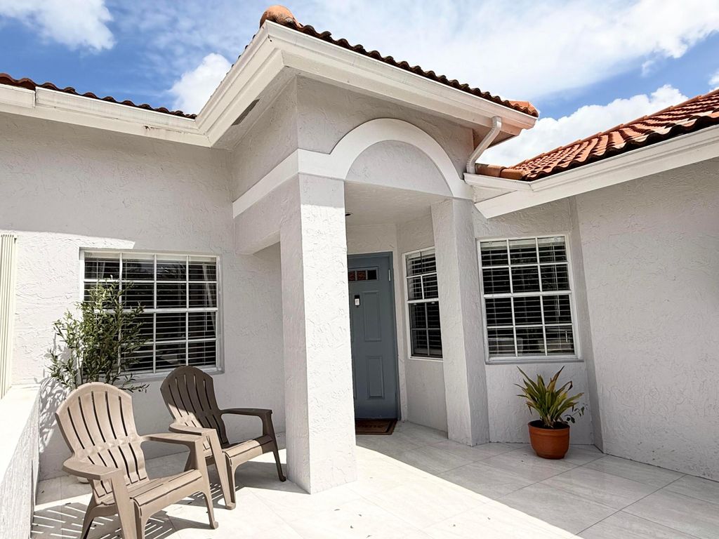 Photo of 15220 W Tranquility Lake Drive, Delray Beach, FL 33446 (MLS # B26012209)