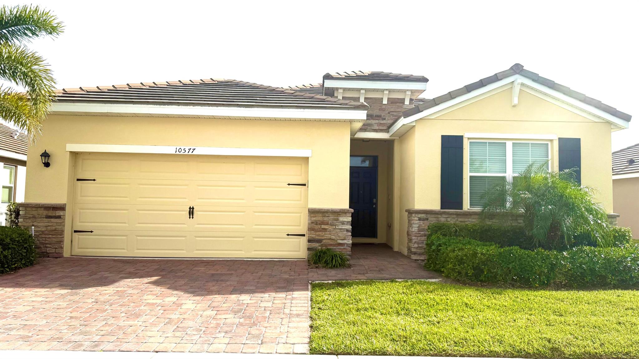 MOTIVATED SELLER!!! Don't miss out! Traditon home that was built in 2020. 4B/2B, 2 car garage, open floor plan, ceramic tile, granite kitchen counter tops w/Breakfast Bar, spacious dining room & living room, concrete Tile Roof, & landscaping w/Irrigation system and large backyard. The owner's suite is nestled in the back of the home for privacy, w/an en-suite bath providing dual vanities, separate Shower, & walk-in closet. Prime location only minutes from fine & casual dining, shops, markets, Hospital, I-95 and FL Tpke.