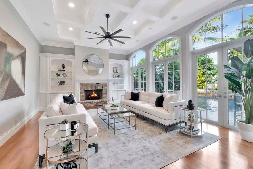 Situated a block and a half from the beach, this quality-built residence boasts the coastal Delray Beach lifestyle at its finest. The private courtyard entry leads you into a spacious interior that includes marble and hardwood floors, coffered ceilings, gourmet kitchen, elevator, dining room, naturally lit semi-formal and casual living rooms allowing for ample entertainment space. The well-appointed outdoor area offers a heated pool, spa, outdoor kitchen, covered loggia with retractable screens, TV and speakers. The primary suite features two walk-in closets, a newly remodeled bathroom and spa shower, and guest bedrooms are generously sized. Located just three blocks from Downtown Delray, and a short drive on A1A to Palm Beach or Boca Raton, this property is the ideal South Florida home.