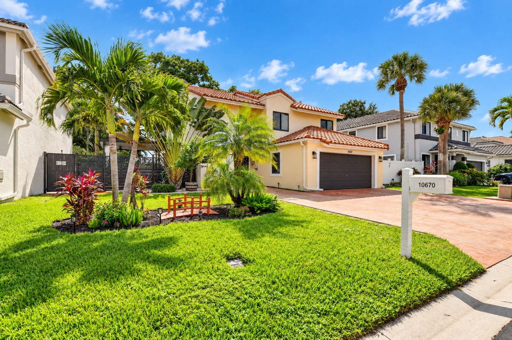 Photo of 10670 Palm Spring Drive, Boca Raton, FL 33428 (MLS # B26091203)