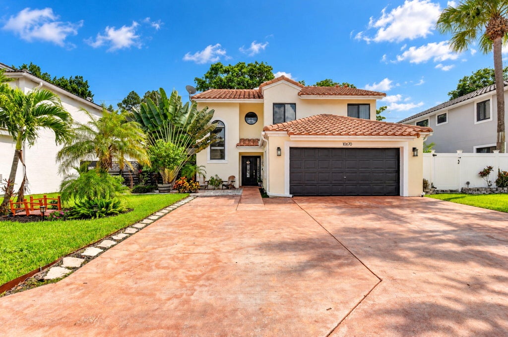 Photo of 10670 Palm Spring Drive, Boca Raton, FL 33428 (MLS # B26091203)