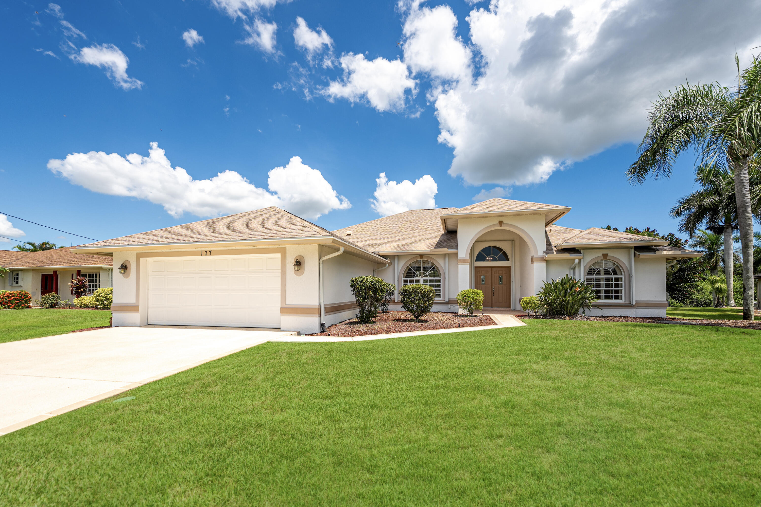 OCEAN ACCESS - MOVE-IN READY!Step into this immaculately clean, light-filled home and be instantly captivated by the stunning views of the pool and waterfront. From the moment you walk in, you'll feel right at home! Pride of ownership shines throughout this beautifully maintained property. Major updates have already been taken care of for you, including Roof (2017) A/C (2022) Water Heater (2017)Water Filtration System (2023)Enjoy the ease of ocean access from your 50-ft dock, complete with water, electric, and an electric boat lift suitable for a generously sized boat. Inside, the home features tile flooring in main living areas and newer vinyl plank flooring in the bedrooms, offering both style and durability. Don't miss this rare opportunity to own a turnkey waterfront home!