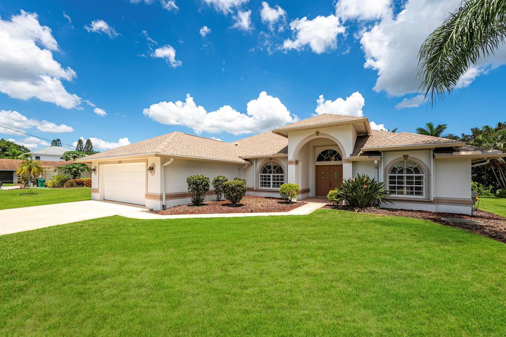 Photo of 177 NE Royce Avenue, Port Saint Lucie, FL 34983 (MLS # R11116358)