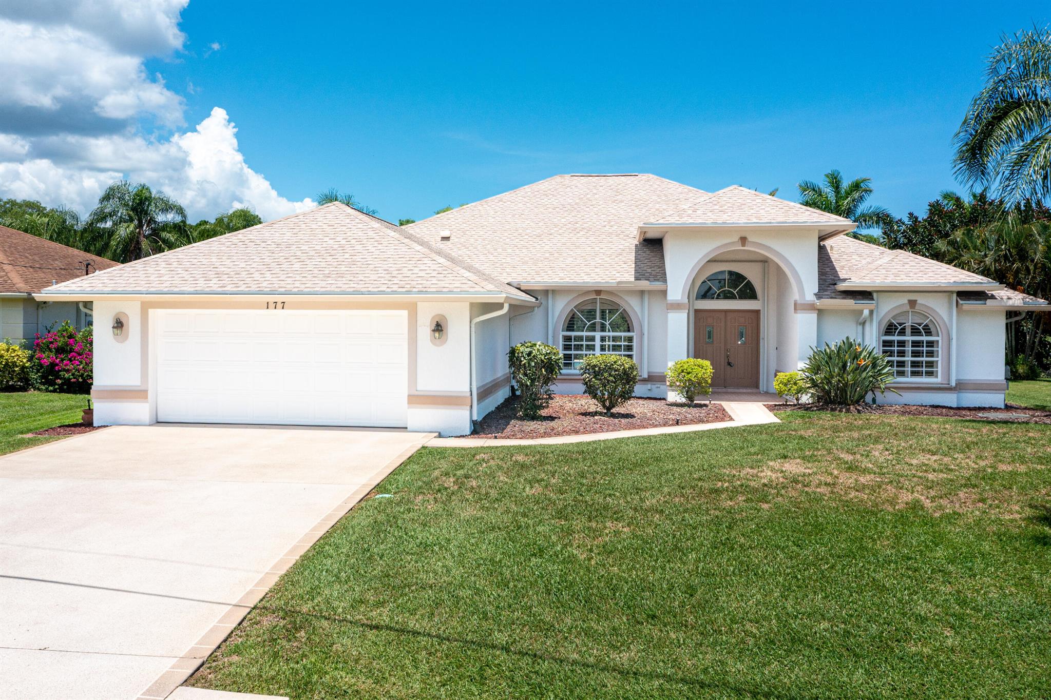 OCEAN ACCESS - MOVE-IN READY!Step into this immaculately clean, light-filled home and be instantly captivated by the stunning views of the pool and waterfront. From the moment you walk in, you'll feel right at home! Pride of ownership shines throughout this beautifully maintained property. Major updates have already been taken care of for you, including Roof (2017) A/C (2022) Water Heater (2017)Water Filtration System (2023)Enjoy the ease of ocean access from your 50-ft dock, complete with water, electric, and an electric boat lift suitable for a generously sized boat. Inside, the home features tile flooring in main living areas and newer vinyl plank flooring in the bedrooms, offering both style and durability. Don't miss this rare opportunity to own a turnkey waterfront home!