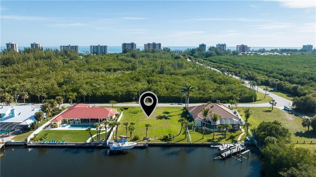 Photo of 83 Queens Road, Hutchinson Island, FL 34949 (MLS # R11057622)