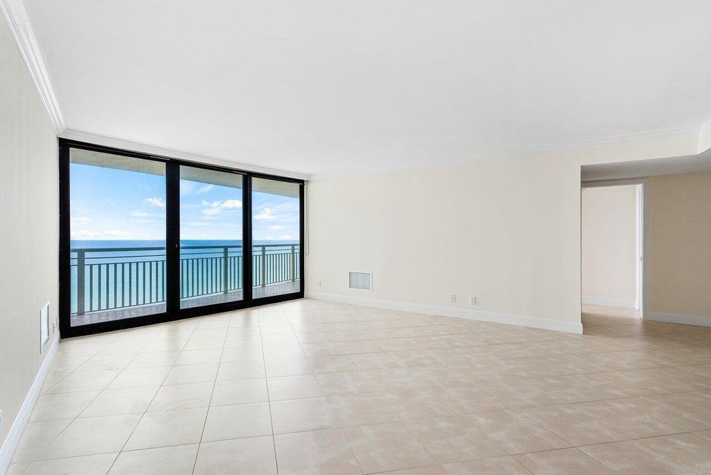 Photo of 3000 N Ocean Drive #33e, Singer Island, FL 33404 (MLS # R11132108)