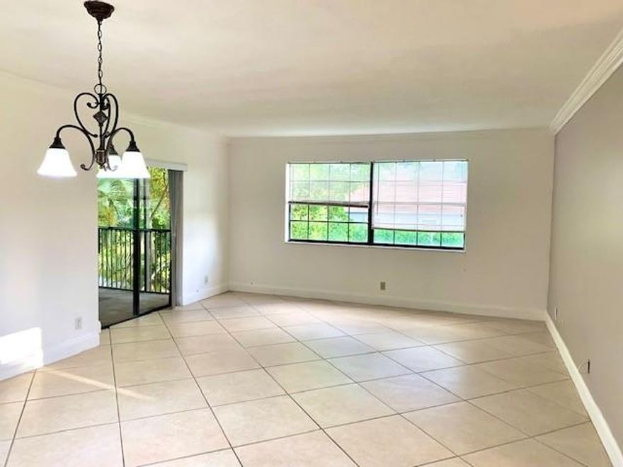 This condo offers 3 spacious  Bedrooms in a split floor plan,  Master bedroom with a walk-in closet, and a sliding door to access the balcony, the living & Dinning  room, on the right side you'll find 2 bedrooms and the second bathroom, Kitchen recently remodeled with the commodity of the washer and dryer inside the unit and storage area. Pool Overlooking the Canal .This Condo is just Steps away from Schools: WESTCHESTER, SAWGRASS MIDDLE AND GLADES. Enjoy the proximity of Parks, the SportsPlex , Panthers Ice-skating, and access to Sawgrass express way. Great opportunity to become a home owner. Perfect for Investors: Rent right away.