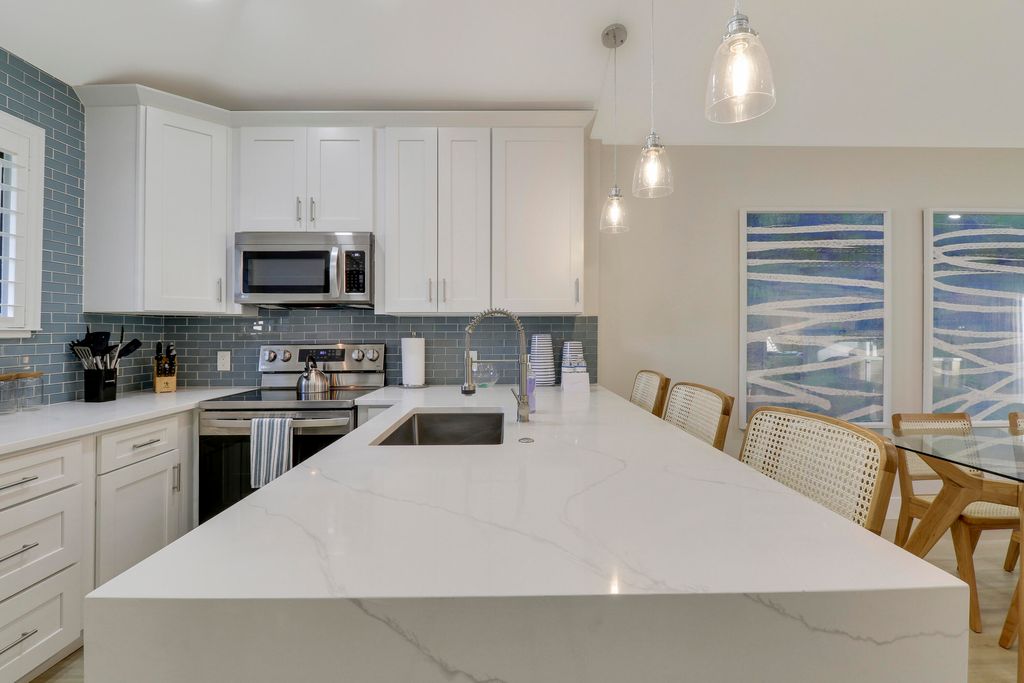 Photo of 523 Club Drive, Palm Beach Gardens, FL 33418 (MLS # B26001706)