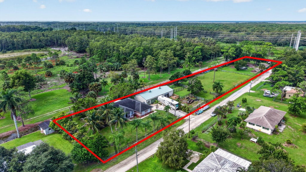 Photo of 10920 Barn Road, Lake Worth, FL 33449 (MLS # B26077161)