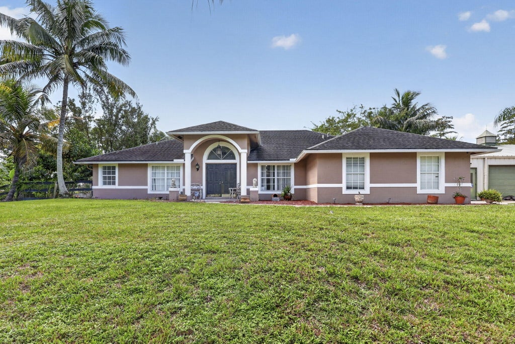 Photo of 10920 Barn Road, Lake Worth, FL 33449 (MLS # B26077161)