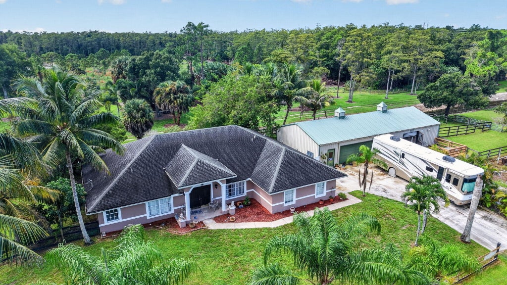 Photo of 10920 Barn Road, Lake Worth, FL 33449 (MLS # B26077161)