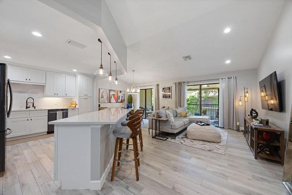 Photo of 5710 Coach House Circle #F, Boca Raton, FL 33486 (MLS # R11155853)