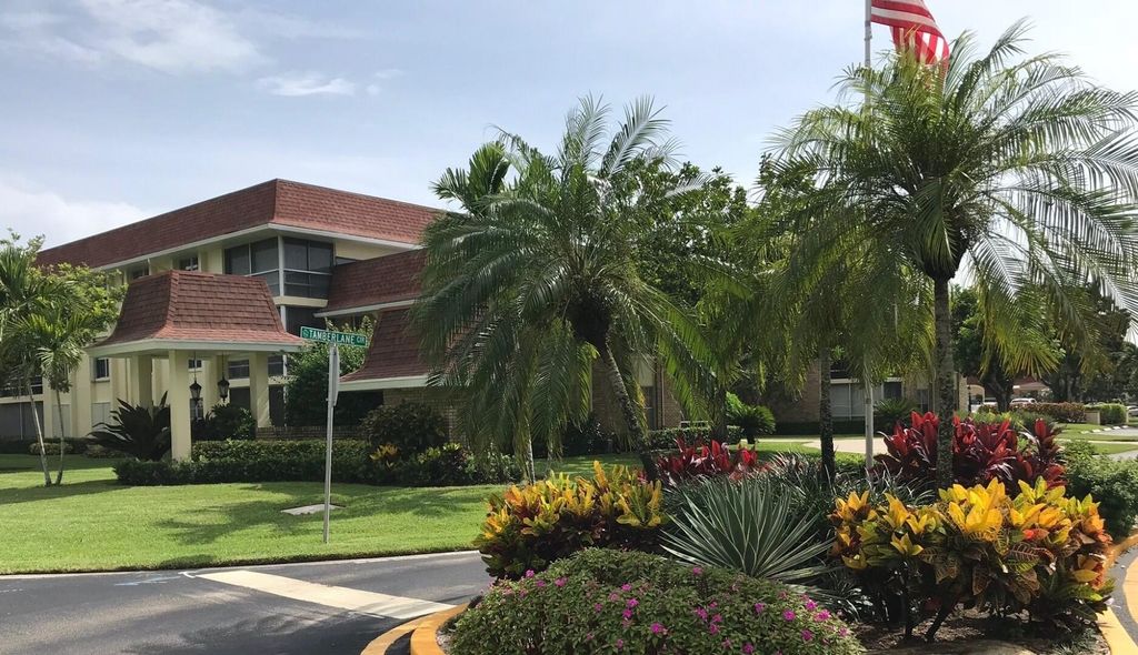 Photo of 5500 Tamberlane Circle #104, Palm Beach Gardens, FL 33418 (MLS # R11169864)