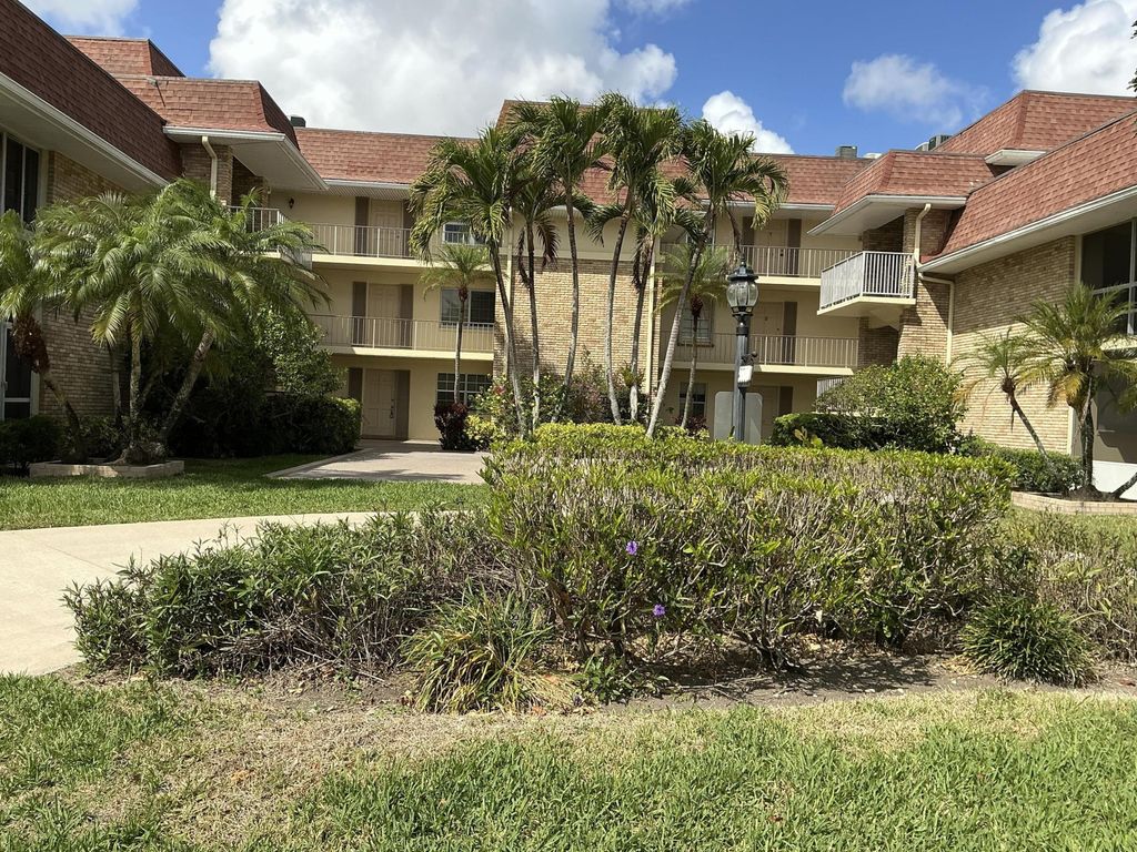 Photo of 5500 Tamberlane Circle #104, Palm Beach Gardens, FL 33418 (MLS # R11169864)