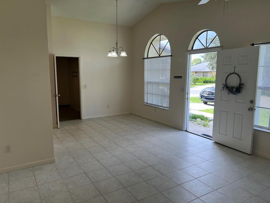 Photo of 5879 SE Wilsie Drive, Stuart, FL 34997 (MLS # R11144477)
