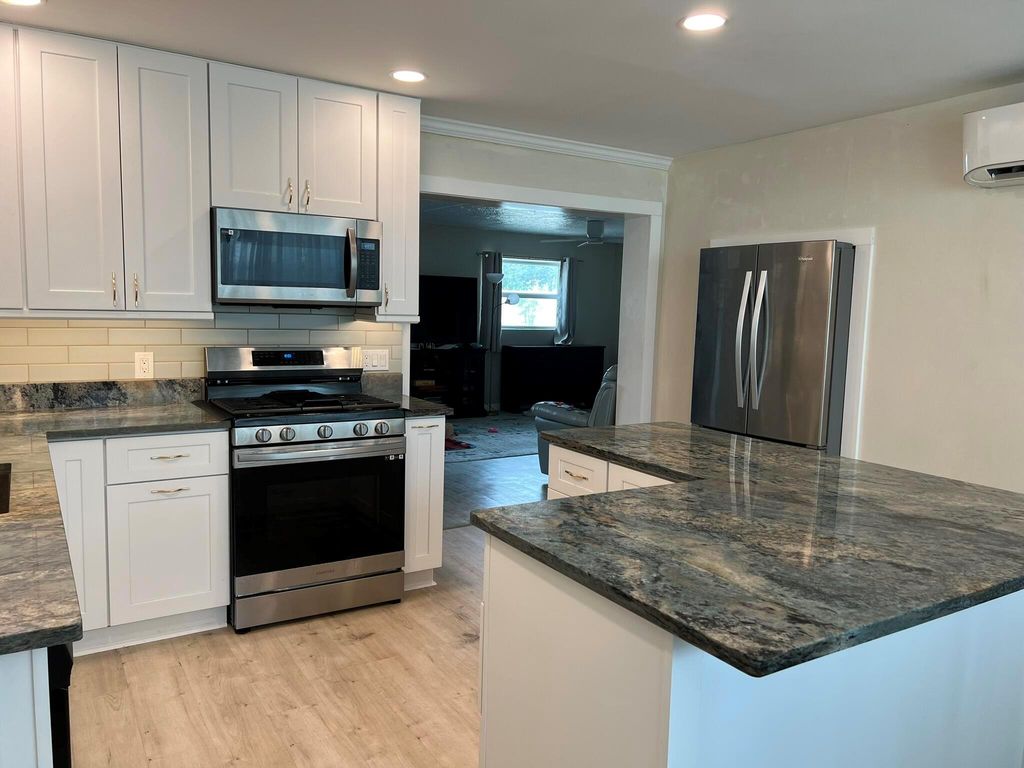 Photo of 46 Sioux Lane, Lake Worth, FL 33462 (MLS # R11091299)