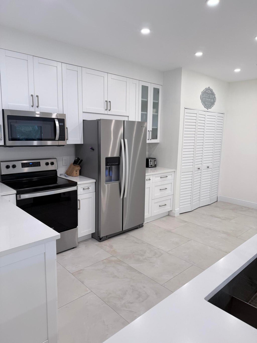 Photo of 1640 Twelve Oaks Way #305, North Palm Beach, FL 33408 (MLS # B26075399)