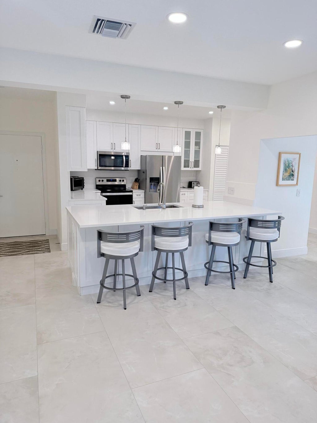 Photo of 1640 Twelve Oaks Way #305, North Palm Beach, FL 33408 (MLS # B26075399)