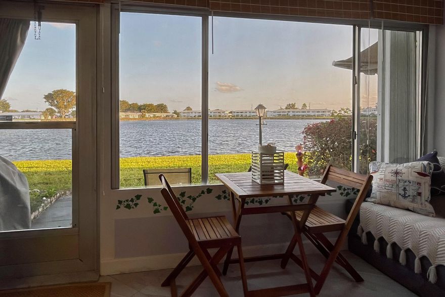 Enjoy peaceful lakefront living in this beautifully updated first-floor condo located in the sought-after 55+ community of Leisureville. Bright open layout features an updated kitchen with modern cabinetry, granite counters, new dishwasher and microwave, and neutral tile flooring throughout. Renovated bath, impact windows in bedrooms, new HVAC and water heater offer comfort and peace of mind. Offered furnished for easy move-in. Leisureville amenities include par-3 golf course, 3 clubhouses, fitness center, billiards, shuffleboard and 3 heated pools. Minutes to shopping, dining and beaches.