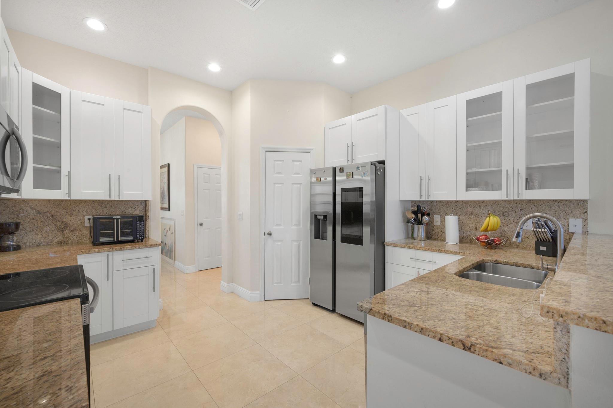 Beautiful 4-Bedroom, 3-Bath Home — Perfect for Growing Families!
Built in 2020, this spacious and thoughtfully designed home offers modern comfort with room for everyone. The open-concept kitchen and family room is a dream for family gatherings, featuring sleek countertops, custom cabinets, and top-tier stainless steel appliances. The primary suite is a private retreat with a spa-inspired bathroom. The three additional sized bedrooms, plus a den that makes a perfect home office, study space, or playroom. One of the bedrooms includes a private entrance, ideal for an older child, in-laws, or guests' and walk-in shower. All-impact windows and doors provide safety during storm season, reducing outside noise.
