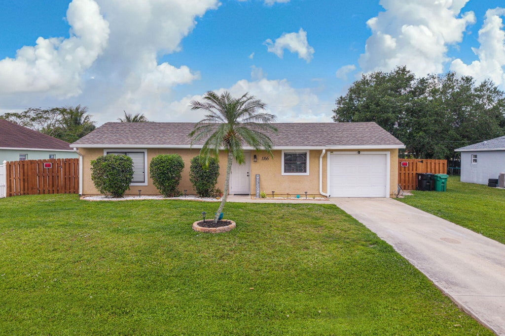 Photo of 1166 SW Cynthia Street, Port Saint Lucie, FL 34983 (MLS # R11078418)