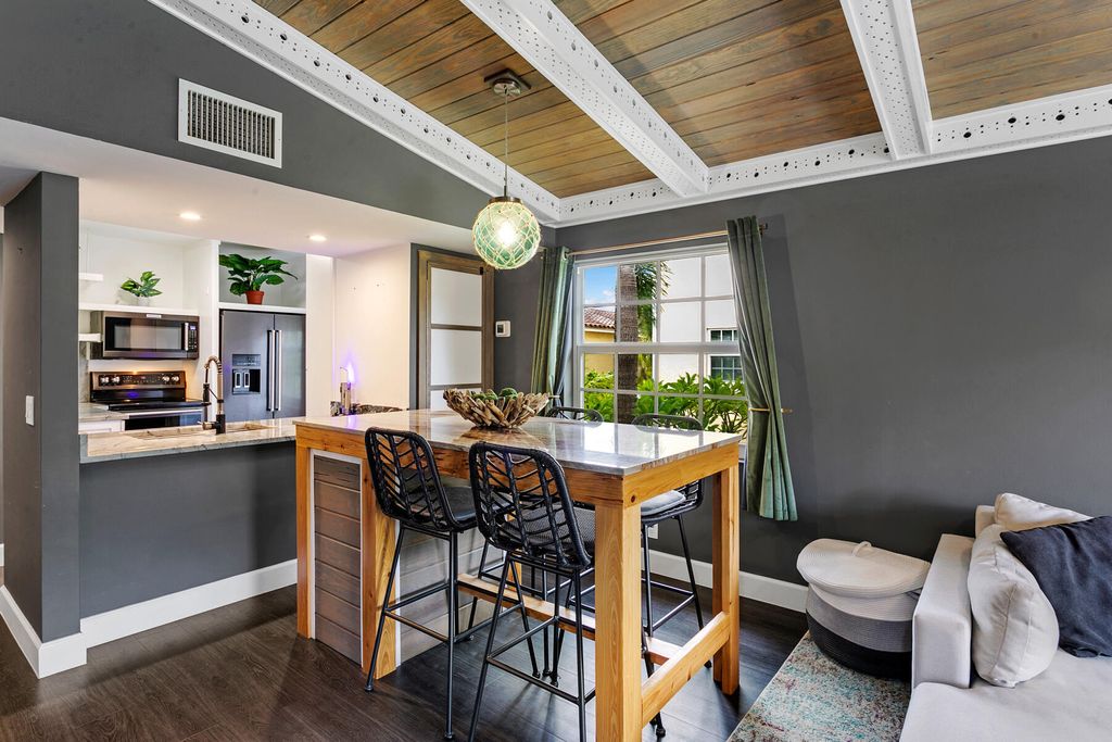 Photo of 1025 Lake Shore Drive #204, Lake Park, FL 33403 (MLS # R11011904)