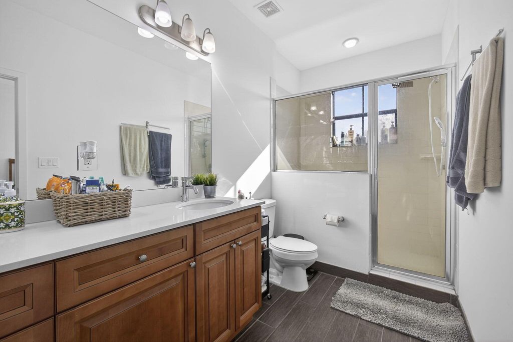 Photo of 6017 Pine Tree Way, Riviera Beach, FL 33410 (MLS # R11149043)