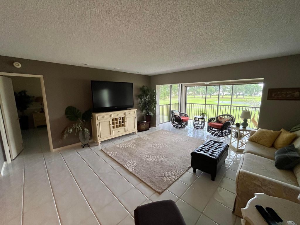 Photo of 12870 Briarlake Drive #205, West Palm Beach, FL 33418 (MLS # B26017206)