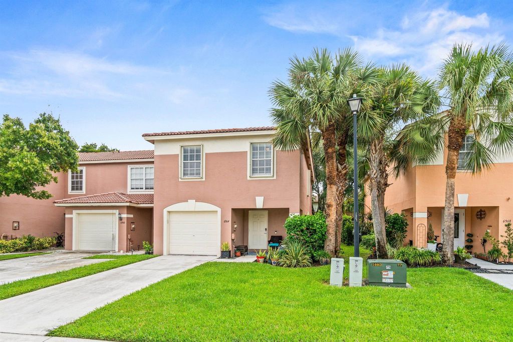 Photo of 6964 Mill Brook Place, Lake Worth, FL 33463 (MLS # R11119391)