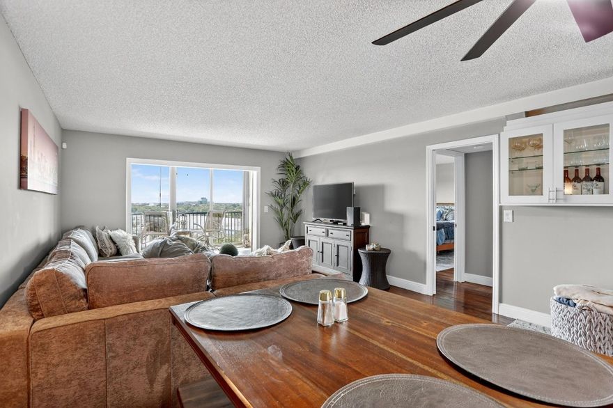 Resort life is calling! Makel this beautifully appointed and spacious 2/2 your next home! With a generous floorplan, a primary with a sitting area, a large balcony with expansive views, an indoor private laundry room and thoughtful updates you have the perfect place to rest after enjoying the plentiful resort-style amenities that Cypress Bend has to offer. Pickleball, tennis, pools, clubhouse, full gym, and lush walking paths will make coming home be like being on vacation year round. A convenient location, close to shopping, dining, Top-Golf, casino and The Pomp as well as providing easy access to 95, the turnpike- and the beach! For rent or for sale, this condo will provide everything the next resident could want in a comfortable and beautiful place to call home. Live like you are on vacation in this amenity rich community conveniently located and beautifully appointed condo!