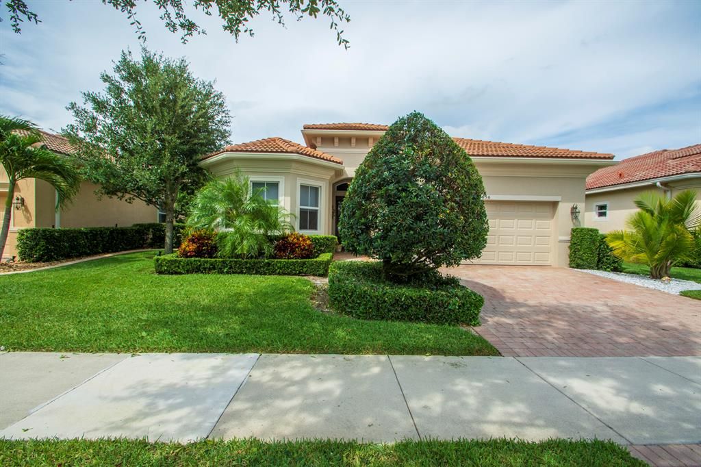 Photo of 9656 SW Nuova Way, Port Saint Lucie, FL 34986 (MLS # R10724320)