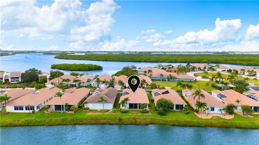 Perfect lakefront location where you can feel the cool breezes on your 2 expansive screened lanais while unwinding after a day of island fun. A separate casita is ideal for visiting family seeking their own space. Inside, architectural details include decorative niches, crown moldings, & plantation shutters. The enormous master sanctuary has tray ceilings, dual vanities, soaking tub, & lake views from the screened porch access. The eat-in kitchen w/its generous breakfast bar is ready for your next gathering. Island community has a pool, tennis, beach access, & marina w/boat slips available!