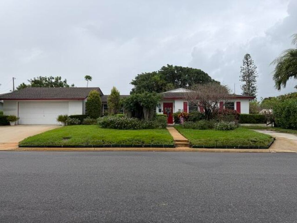 Photo of 1556 W 35th Street, Riviera Beach, FL 33404 (MLS # B26015057)
