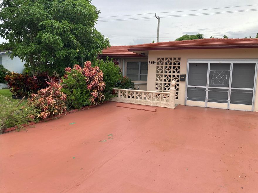 Beautiful and Spacious 2 Bedrooms 2 Baths with Enclosed huge Florida Room with AC  and can be converted to 1 or 2 more Bedrooms if you have a big family, one car attached Garage with automatic garage opener, Tile Roof 12 years old, Partially repiped, Water Heater 3 years old in Pristine and peaceful Mainlands 8 section a 55 Plus Community. The back yard features all kinds of tropical Fruit trees like Avocado trees, Mango trees, Banana trees and so forth. Serene Location come live your best life in this great community with planned recreational activities, a Sparkling Community pool & Playground. Children 18 years of age or Older are welcome.