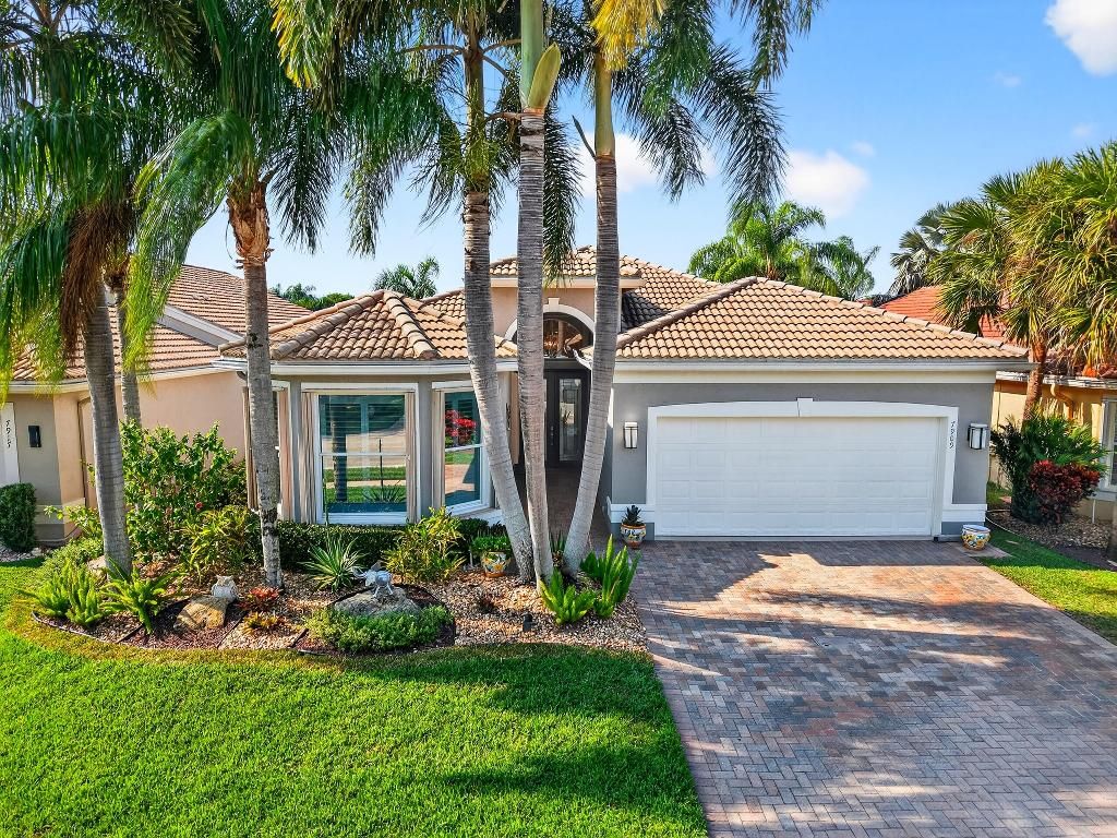 Photo of 7909 Seagrape Shores Drive, Lake Worth, FL 33467 (MLS # R11149148)
