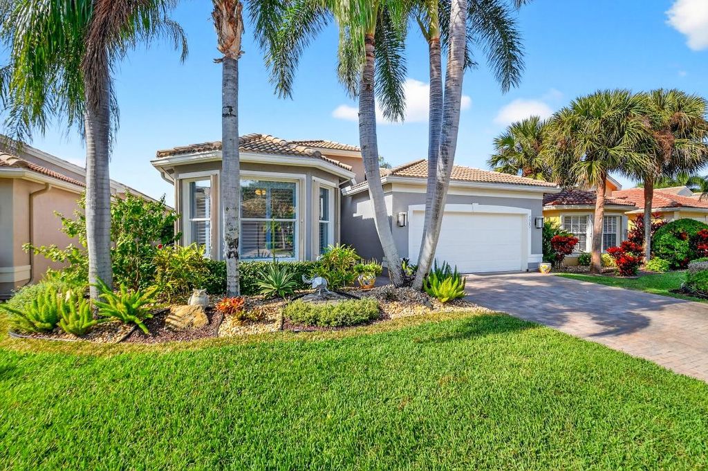 Photo of 7909 Seagrape Shores Drive, Lake Worth, FL 33467 (MLS # R11149148)