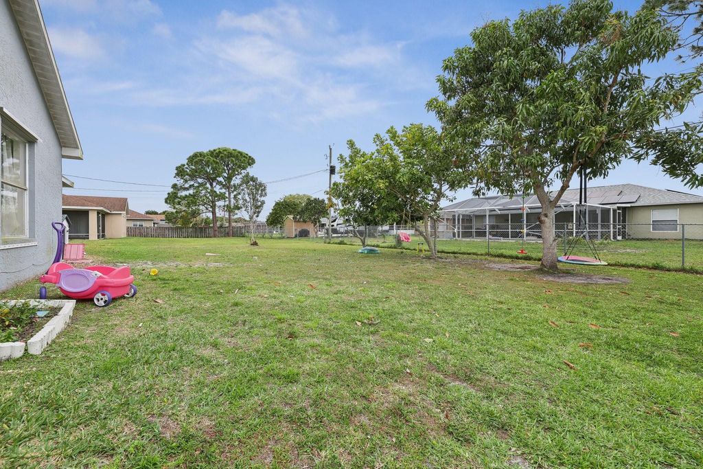 Photo of 465 SW Eyerly Avenue, Port Saint Lucie, FL 34983 (MLS # F10430438)
