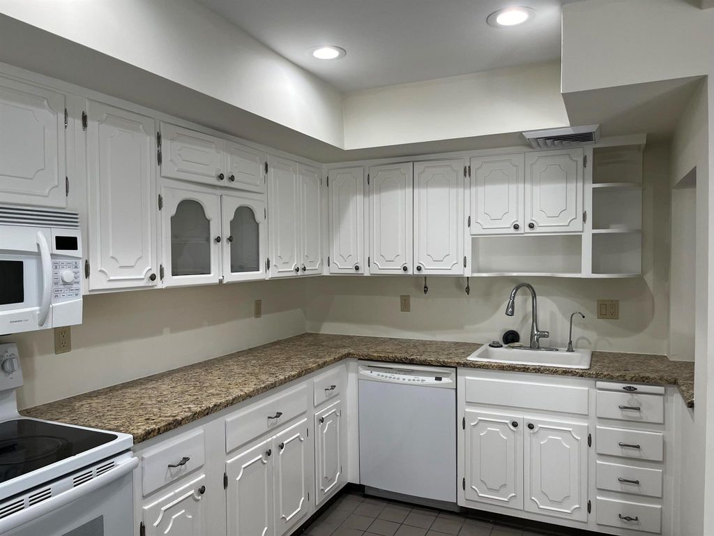 Photo of 346 Yorktowne Circle, Atlantis, FL 33462 (MLS # R11104255)