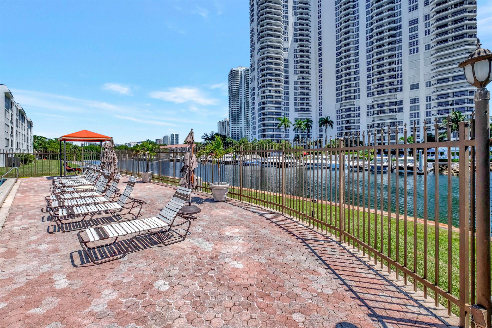 Excellent location in the heart of Aventura, walking distance to Aventura Mall, minutes from the beach, A rated schools and the unit is freshly painted with a covered patio that has an intracoastal view. The grounds are well kept with beautiful lush landscaping and community pool overlooking the Miami skyline and intracoastal This is an all ages building that is gated with security and a very reasonable HOA. No rentals are permitted.