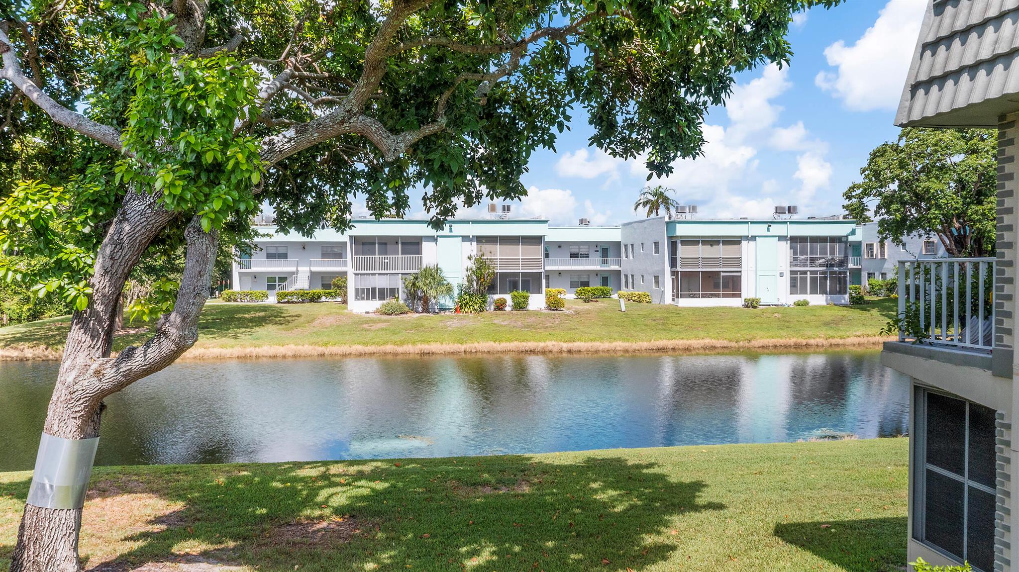 Bright & Spacious 2BR/2BA Corner Unit in Kings Point! This well-maintained, light-filled corner unit offers comfortable living in one of South Florida's most desirable 55+ communities. The kitchen features white cabinets and granite countertops, combining style and functionality. With a NEW ROOF , the home is move-in ready and offers peace of mind for years to come. Enjoy the convenience of a quiet, established neighborhood with easy access to shopping, dining, medical facilities, and more. Kings Point residents enjoy resort-style amenities including multiple pools, hot tubs, tennis courts, a fully equipped fitness center, a clubhouse with social activities, and a community shuttle. Whether you're looking to relax or stay active, this vibrant community offers the lifestyle you deserve!