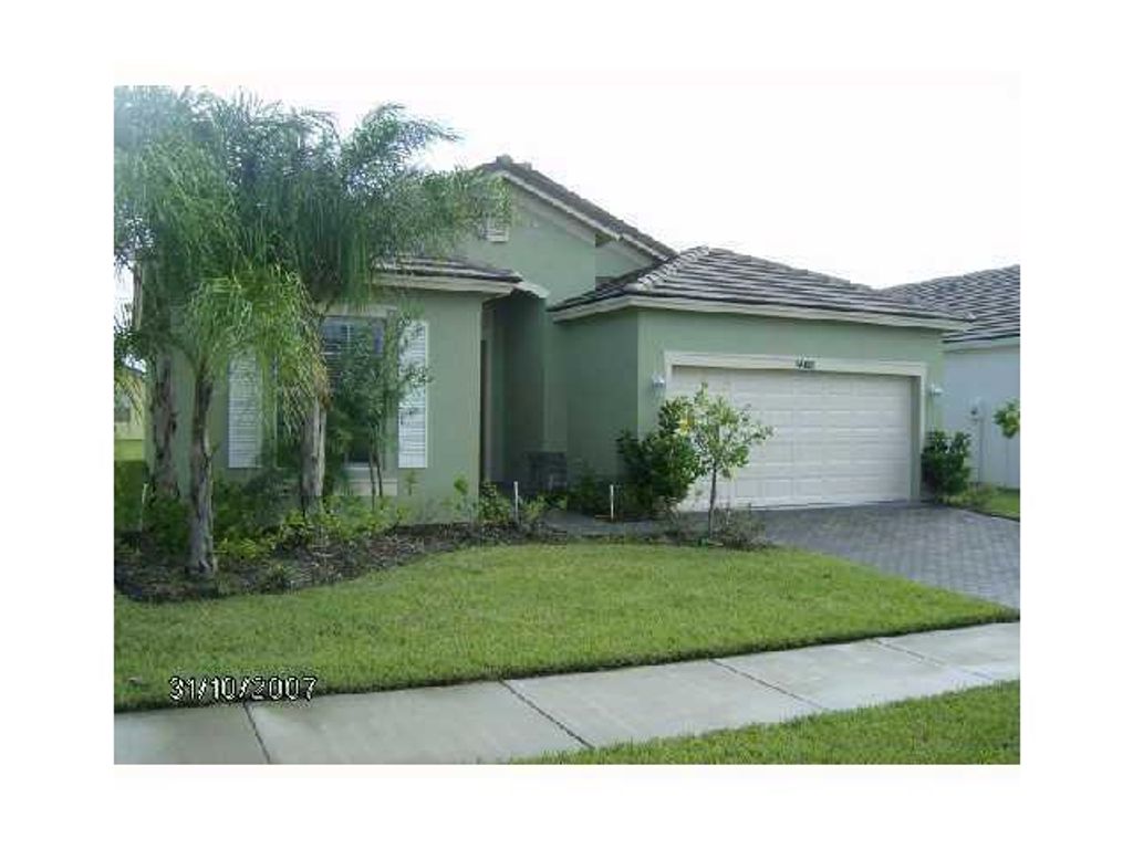 Photo of 9980 SW Stonegate Drive Dr, Port St Lucie, FL 34987 (MLS # R10697669)