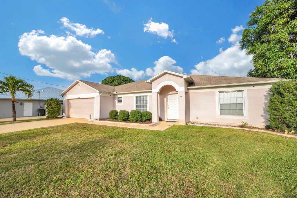 Photo of 2671 SW Chestnut Lane, Port St Lucie, FL 34953 (MLS # R10859293)