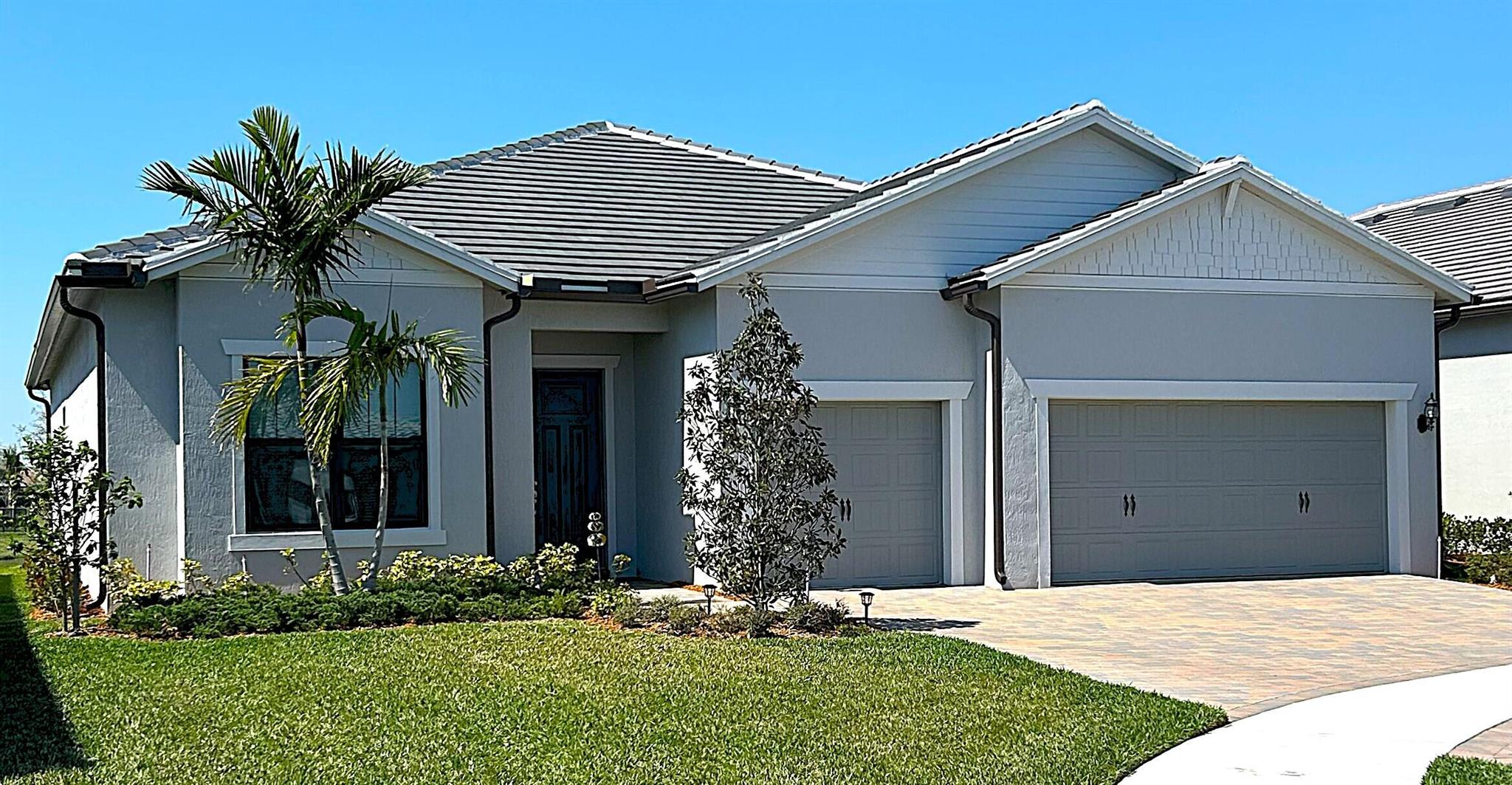 This ''ASHBY'' model home located in the highly sought after Veranda Gardens at the end of a very small, quiet and private cul-de-sac. Please come see this immaculate, like new, 2024, 3 bed, 2.5 bath home w/ office/den. Upon entering you will notice the 10' ceilings, 8' doors, abundant natural light and fabulous lake view thru the 20' wide pocket doors. The office/den is entered thru custom French doors, open concept living, spilt floorplan, large diagonal ceramic tile flooring, surrounded by high impact windows/doors. The kitchen boasts all SS appliances, gas cooktop, quartz and custom tile backsplash. Two tone soft-close cabinets/drawers, 11' island for entertaining. Lovely accent walls and custom paint. Pri suite provides space w/ a water view & tray ceiling.