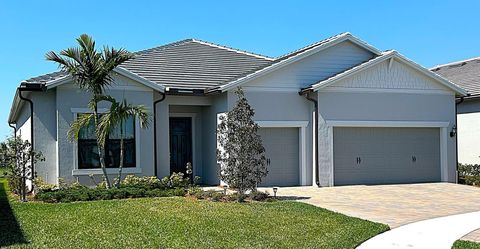 Photo of 410 SE Vallarta Drive, Port Saint Lucie, FL 34984 (MLS # R11095475)